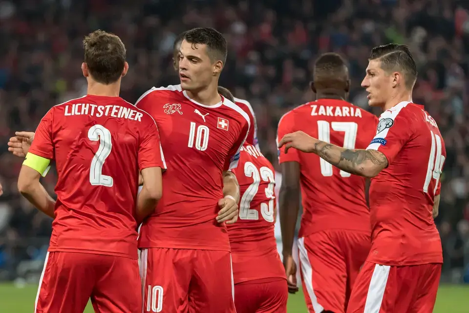 Switzerland players celebrating a World Cup knockout stage win — history of deep runs